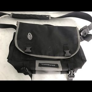 Black and grey Timbuk2 messenger bag